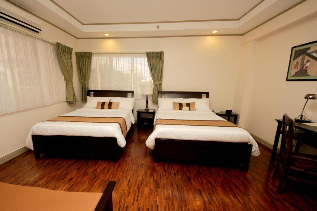 Casa Pura Inn And Suites Кесон-Сити Номер фото