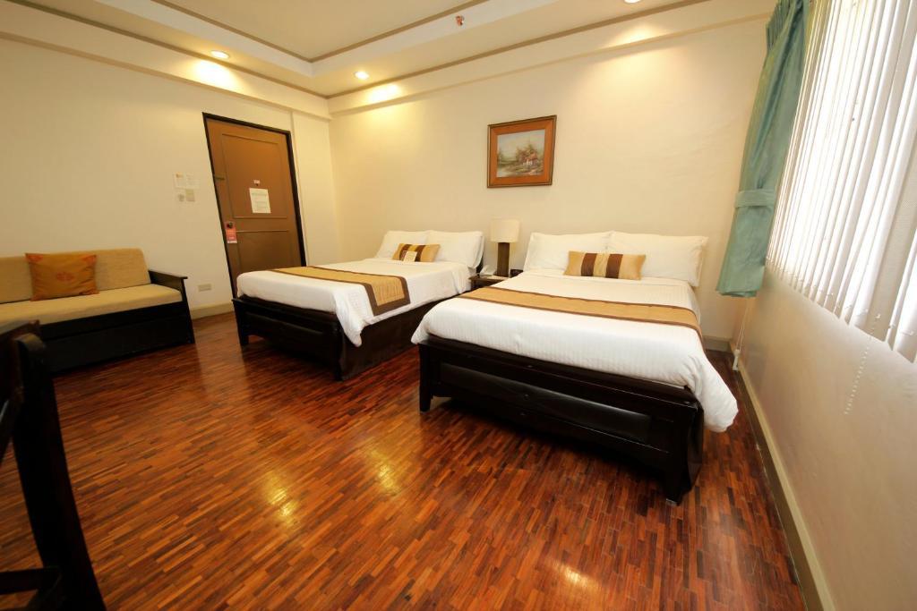 Casa Pura Inn And Suites Кесон-Сити Номер фото